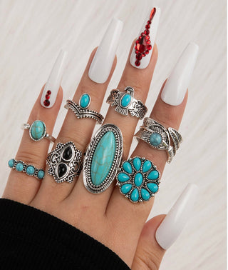 Eight piece turquoise rings set